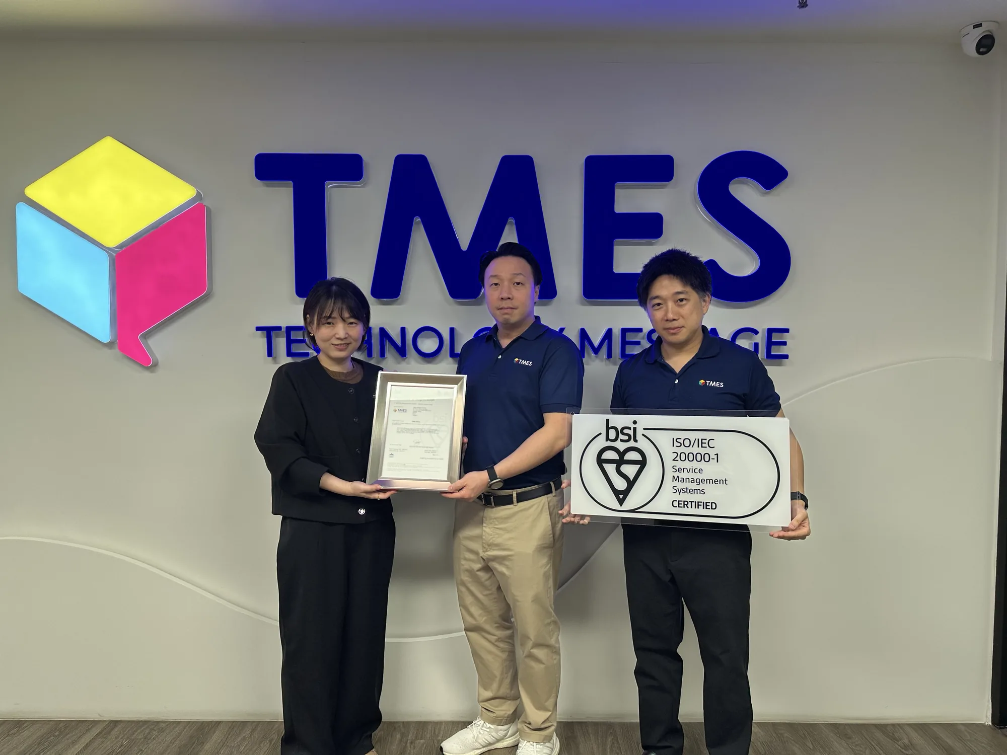 TMES team receiving the ISO/IEC 20000-1 certificate