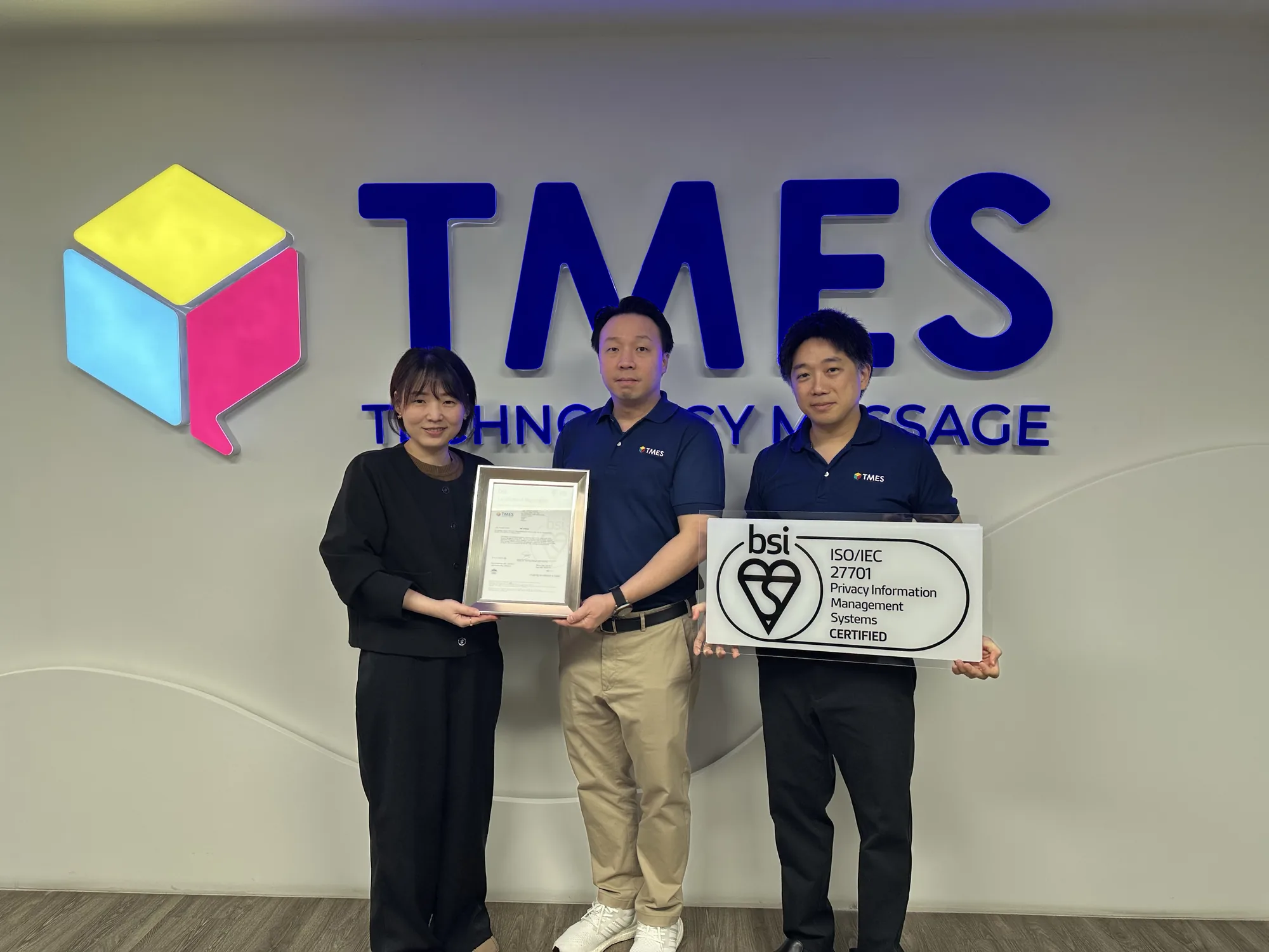 TMES team receiving the ISO/IEC 27701 certificate